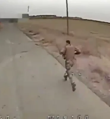 drone chases soldier